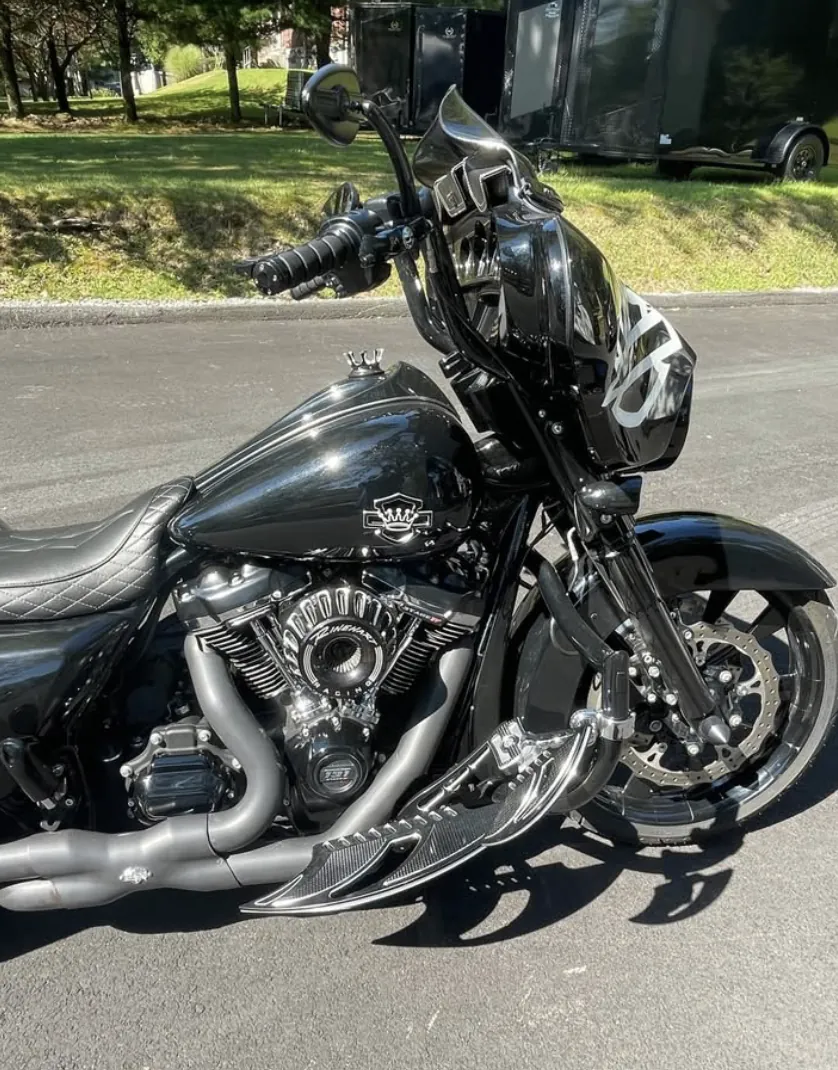2019 Harley-Davidson Street Glide Special, gloss black with white crown Bar & Shield graphics, parked outside